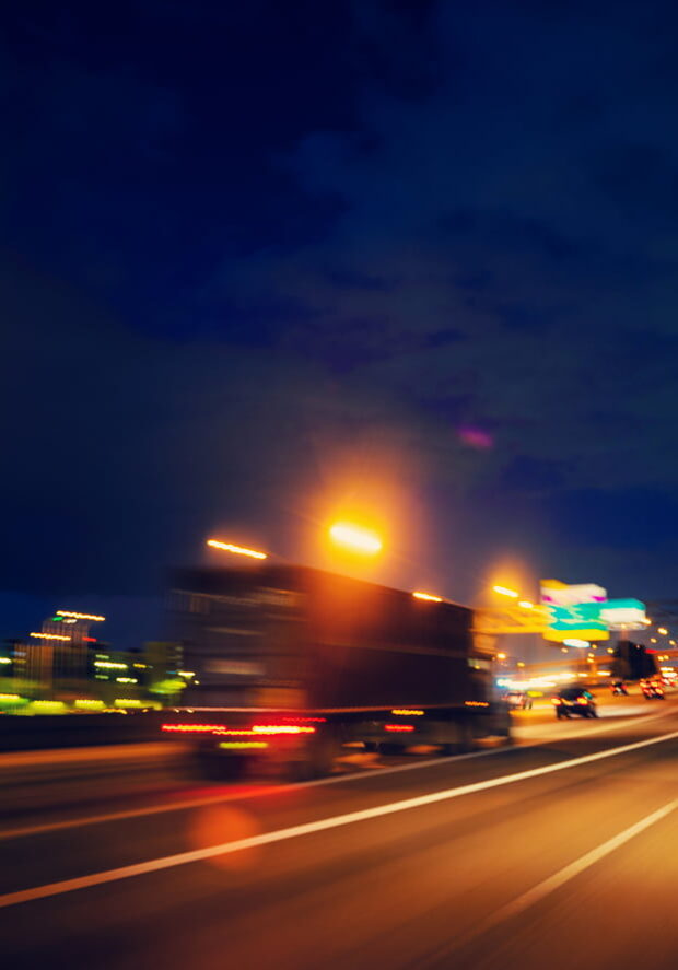 Semi truck at night speeding